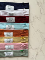 Diadema con lazo de color sólido para implante coclear/audífono